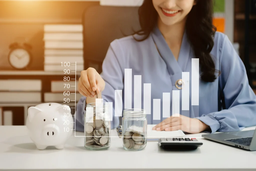 Businesswoman with Coins and Smartphone